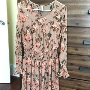 Long sleeved floral dress.